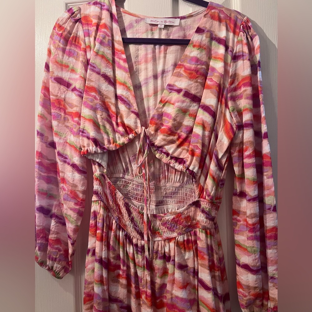 Meet me in Santorini romper. Worn 1x, ties in the front, cut out